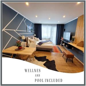 een woonkamer met een bank en een tafel bij Cool Studio - Apartment in Gosau - Hallstatt - Wellness and Pool included in Gosau