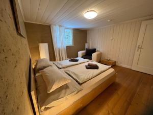 Posteľ alebo postele v izbe v ubytovaní Wood Lodge