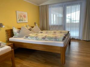 Łóżko lub łóżka w pokoju w obiekcie Appartement Fischer