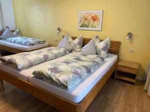 Łóżko lub łóżka w pokoju w obiekcie Appartement Fischer