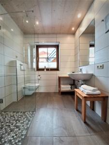 a bathroom with a sink and a shower at Appartement Thunhart Manfred & Doris in Altenmarkt im Pongau