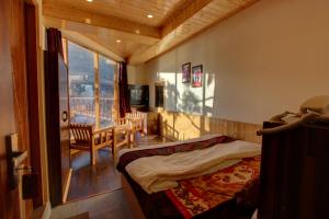 Foto da galeria de 17 Milestones Hotel -River Side em Manali