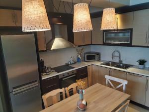 A cozinha ou cozinha compacta de Beach House in Itea-Delphi
