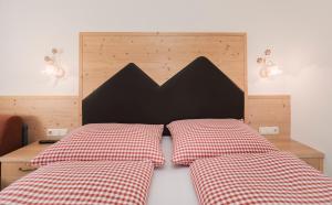 Postel nebo postele na pokoji v ubytování Berghotel Bodenalpe