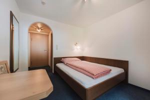 Postel nebo postele na pokoji v ubytování Berghotel Bodenalpe