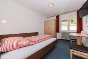 Postel nebo postele na pokoji v ubytování Berghotel Bodenalpe