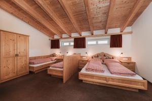 Postel nebo postele na pokoji v ubytování Berghotel Bodenalpe