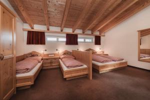 Postel nebo postele na pokoji v ubytování Berghotel Bodenalpe