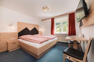 Postel nebo postele na pokoji v ubytování Berghotel Bodenalpe + 27 fotografií