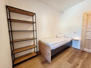 Łóżko lub łóżka w pokoju w obiekcie Ferienwohnung Flachau Oberlehengut