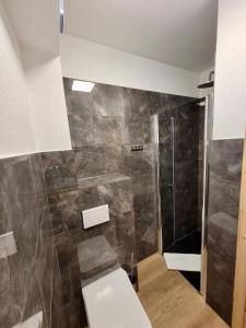 Łazienka w obiekcie Ferienwohnung Flachau Oberlehengut
