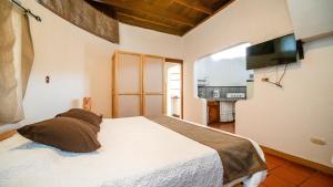 Postel nebo postele na pokoji v ubytování Hotel Luna Llena