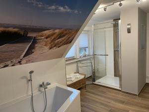 Koupelna v ubytování Bergstadthütte Harz + 27 fotografií
