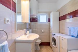 Ванная комната в Apartmani Valun1