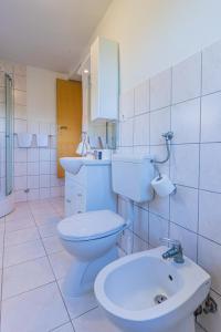 Ванная комната в Apartmani Valun1