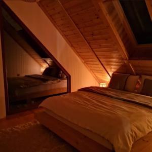 Voodi või voodid majutusasutuse Cortina resort toas