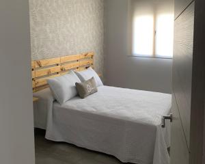 Cama o camas de una habitación en Acogedora casa rural con piscina particularBarlow