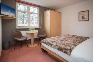 Postel nebo postele na pokoji v ubytování Hotel Kiepenkerl