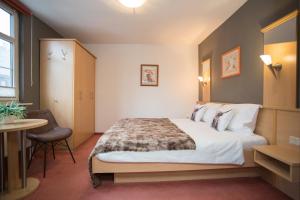 Postel nebo postele na pokoji v ubytování Hotel Kiepenkerl