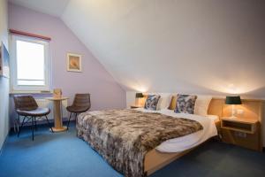 Postel nebo postele na pokoji v ubytování Hotel Kiepenkerl
