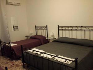 Postel nebo postele na pokoji v ubytování Casa Giulia + 11 fotografií