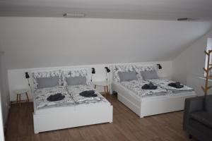 Postel nebo postele na pokoji v ubytování Penzion Víra