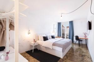 Postel nebo postele na pokoji v ubytování Art Hotel Tartini