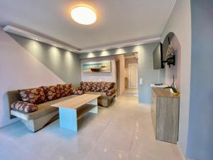 A television and/or entertainment centre at Fener Guest House