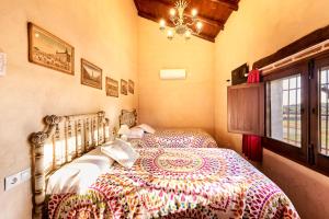 Katil atau katil-katil dalam bilik di Casa Rural Sierra Jayona +59 gambar