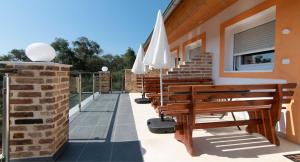 Balkón nebo terasa v ubytování ANEMOMYLOS Lefkimmi LUXUS SUITES-BOUTIQUE HOTEL & POOL