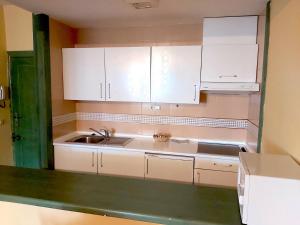 Kuchyň nebo kuchyňský kout v ubytování Plaza Andalucía Edificio Dornajo 2-4 pax