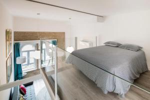 Posteľ alebo postele v izbe v ubytovaní Pop Art Feria luminoso dúplex con terraza privada