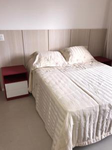 Postel nebo postele na pokoji v ubytování Residencial Ykutiba + 67 fotografií