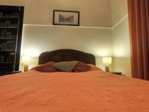 Postel nebo postele na pokoji v ubytování Hostal Tres casas