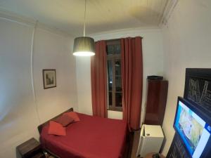 Postel nebo postele na pokoji v ubytování Hostal Tres casas