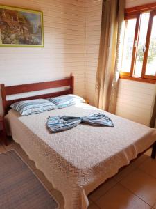 Cama ou camas em um quarto em Sitio Rio Cachimbo
