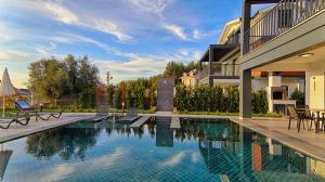 The swimming pool at or close to KAAN VILLA