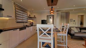 A kitchen or kitchenette at KAAN VILLA