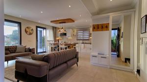 A kitchen or kitchenette at KAAN VILLA