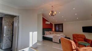 A bed or beds in a room at KAAN VILLA