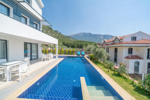 an image of a swimming pool in a house at SAKURA VILLA in Fethiye