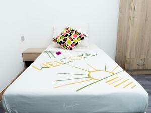 Letto o letti in una camera di iHaven Thulusdhoo