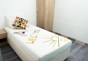 Letto o letti in una camera di iHaven Thulusdhoo