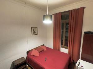 Postel nebo postele na pokoji v ubytování Hostal Tres casas