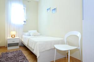 Posteľ alebo postele v izbe v ubytovaní Exclusive Center Apartments
