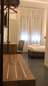 Postel nebo postele na pokoji v ubytování Hotel Doria - Business & Bike