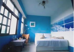 Letto o letti in una camera di Wushih Surf Hostel