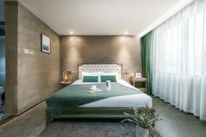 Letto o letti in una camera di Suzhou Unique Space Design Art Hotel