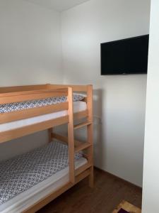 Postel nebo postele na pokoji v ubytování Appartments Zirbennest