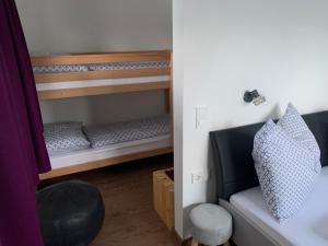 Postel nebo postele na pokoji v ubytování Appartments Zirbennest